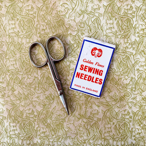 Tiny vintage thread scissors and needles