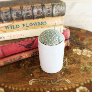 Pin cushion in antique Ointment Jar no.9