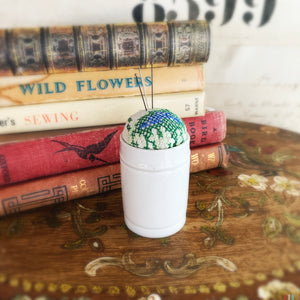 Pin cushion in antique Ointment Jar no.7