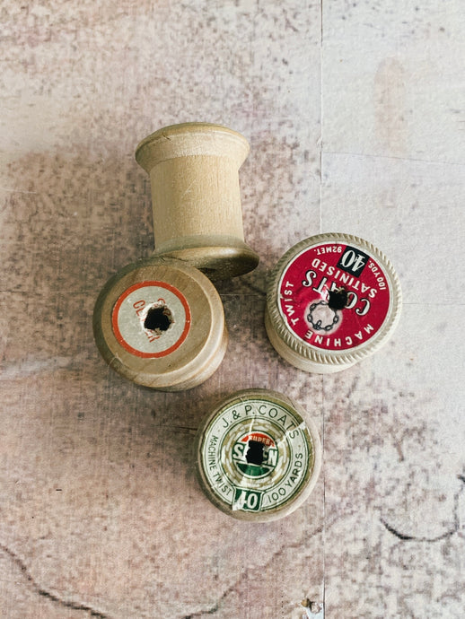 4 vintage small cotton reels -empty