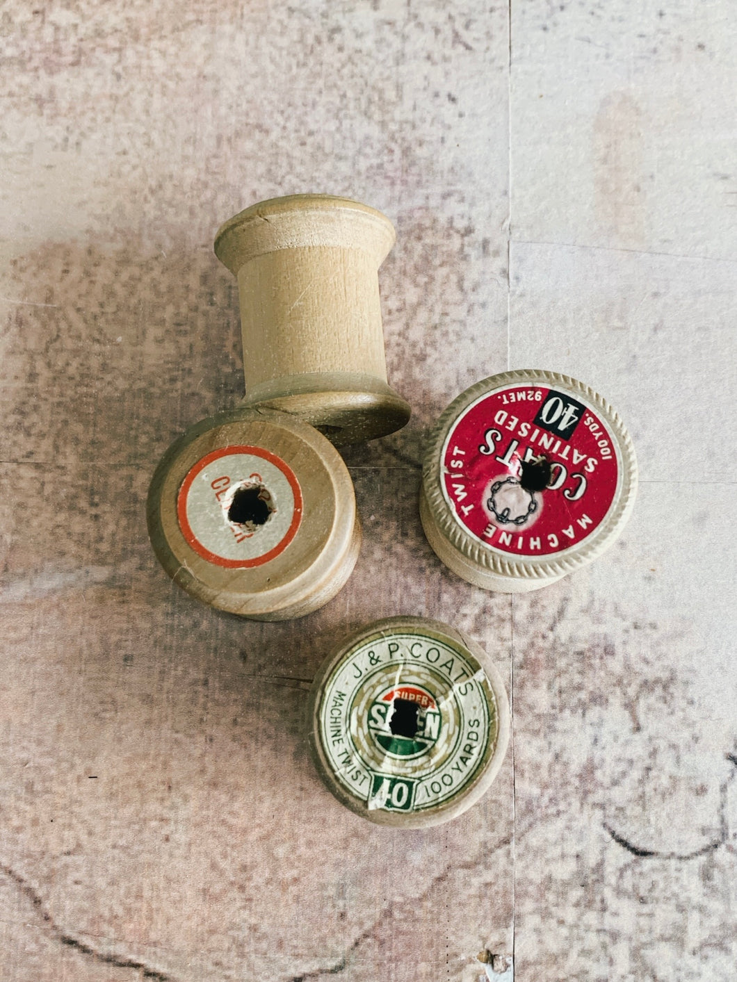 4 vintage small cotton reels -empty